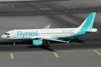 Flynas Airbus A320-214 at Dubai International Airport