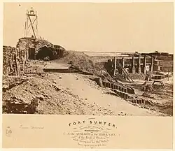 Interior view of Ft Sumter in 1865; at left is the "Light house" of Ft Sumter