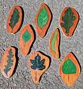 Wooden leaves for a summer nature trail