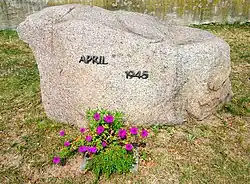 Memorial stone for the refugees and civilians killed at the very first meeting spot in Lorenzkirch, Germany