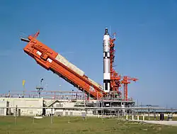The erector is lowered in preparation for the launch of Gemini 5.