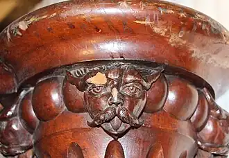 Detail of a mascaron on the baluster of the first floor of the main staircase (1862)