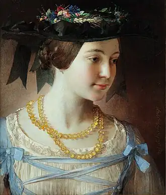 Girl with an amber necklace