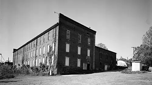 Photo of a brick factory building