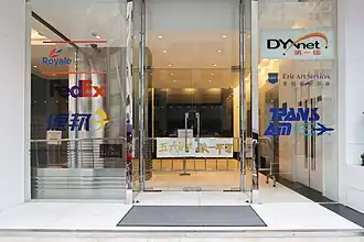 A banner reading "Five Demands, Not One Less" was placed on a barricade at the entrance of the International Commerce Centre.