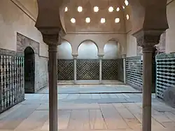 Warm room of the Nasrid-era Comares Baths at the Alhambra in Granada, Spain (14th century)