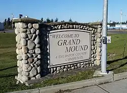 Town sign for Grand Mound, located at main intersection
