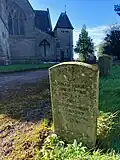 Fr. Flannery's grave in Belmont Abbey, on the right, near the graveyard entrance