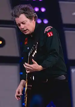 White performing with Green Day in 2024