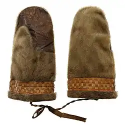 Men's seal fur mittens with sealskin palm and trim. East Greenland Inuit, Amassalik distrikt, Tasiilak