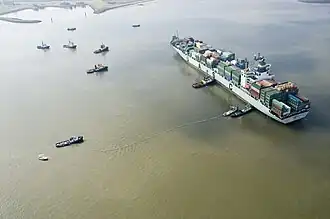 Container ship grounded and broken in the river Scheldt