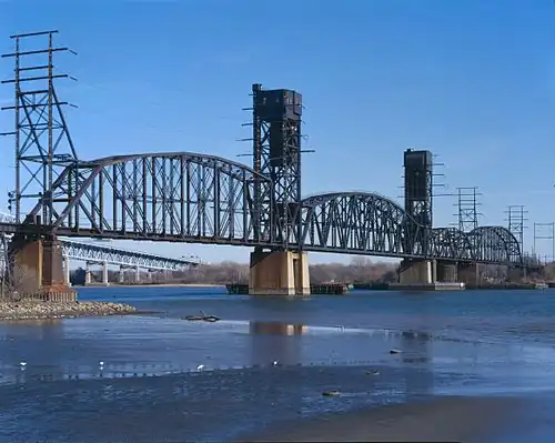 Steel lift bridge crossing a river