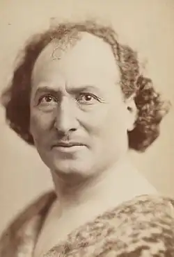 Black and white portrait of a white man with receding hair