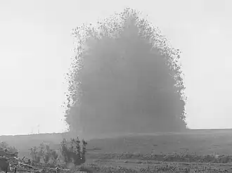 Explosion of the mine beneath Hawthorn Ridge Redoubt on the Western Front during World War I (July 1, 1916). Photo by Ernest Brooks