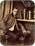 Self-portrait with camera equipment, circa 1858