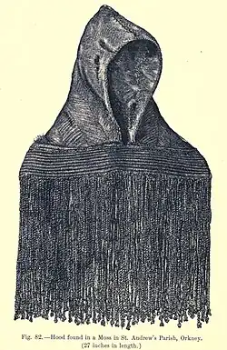 An illustration of a hood with a fringe along the bottom hem