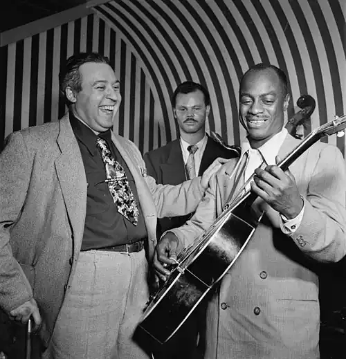 Hugues Panassié (left) Red Prysock (middle) and Tiny Grimes (right), New York City, c. 1946–1948, photograph by William P. Gottlieb