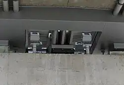 Uplighters on the southern riverside pier illuminating the southern end of the arch