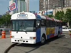 A shuttle bus pulling into the terminal