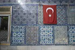 Iznik tile panels on the outside wall of the mausoleum