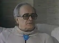 An image of a man with dark glasses