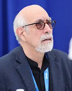 DeMatteis seated at a table