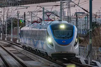 A 4-car CCD2031 train on the Airport Link Line
