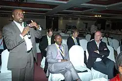 Jabulani Dhliwayo addressing a summit in Tanzania