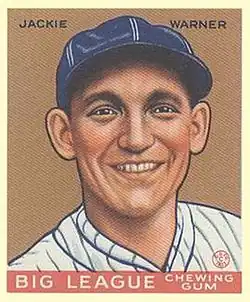 A baseball card image of a smiling man wearing a blue baseball cap