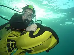 Recreational diver using a lightweight diver propulsion vehicle