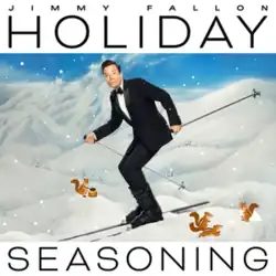 Album cover featuring Jimmy Fallon skiing while wearing a suit and surrounded by cartoon chipmunks