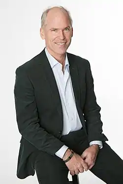 John Sedgwick, writer, seated