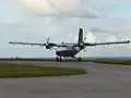 Propeller plane preparing for takeoff from Flat Point