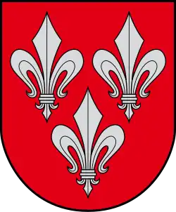 A coat of arms depicting three grey fleurs-de-lis, two directly across from each other at the top and one on the bottom, all on a red background