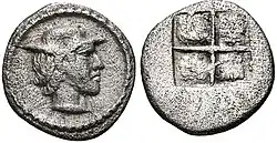 Coin of Alexander I, struck circa 460-450 BC. Young male head right, wearing a petasos.