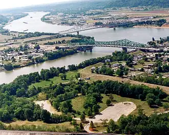 Point Pleasant (foreground) at the confluence of the Kanawha and Ohio Rivers. Gallipolis, Ohio, is in the background right while Henderson, West Virginia, is on the left.