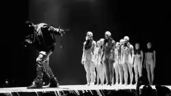 A masked Kanye West performing "I Am a God" at Barclays Center on December 14, 2013, in Brooklyn, New York on The Yeezus Tour.