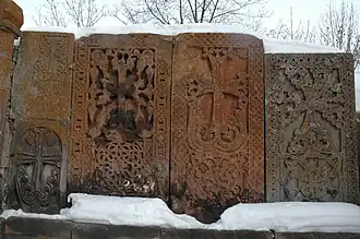 Row of khachkars in the snow