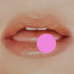 An open mouth with a pink dot in its bottom left corner
