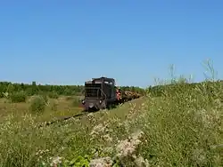 Locomotive TU7A-2787 with freight train