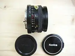 28 mm f/3.5 with caps (style 3, c. 1974–1982)