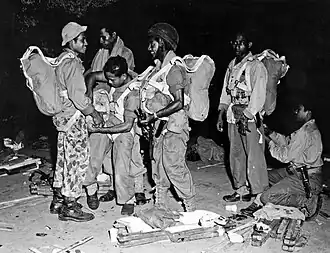 Paratroopers are being prepared for an action (1948)