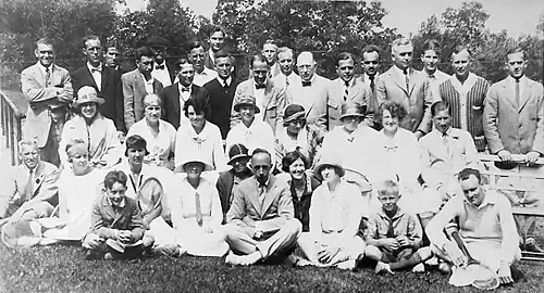 (7th from the top left.) A tournament is going on at Lake Mohonk. He went on to win singles and doubles. Lauretta is seated second from the lower left. 1924
