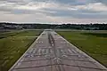 View from a plane landing on runway 32 at Holman Field