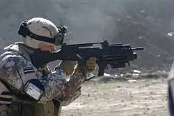 A Latvian soldier with the G36V/AG36 combination