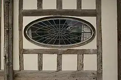 Leaded glass window, High Street, Saffron Walden. In this case the came is an integral part of the artistic composition.