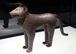 Leopard aquamanile; 17th century; brass; Ethnological Museum of Berlin. The bronze leopards were used to decorate the altar of the oba. The leopard, a symbol of power, appears in many bronze plaques, from the oba's palace.
