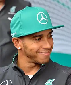 A photo of Lewis Hamilton wearing a hat