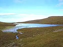 The small Loch na Claise Carnaich in the north-east that flows into Loch a' Bhaid-luachraich