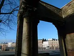 Detail of narthex, barracks in background